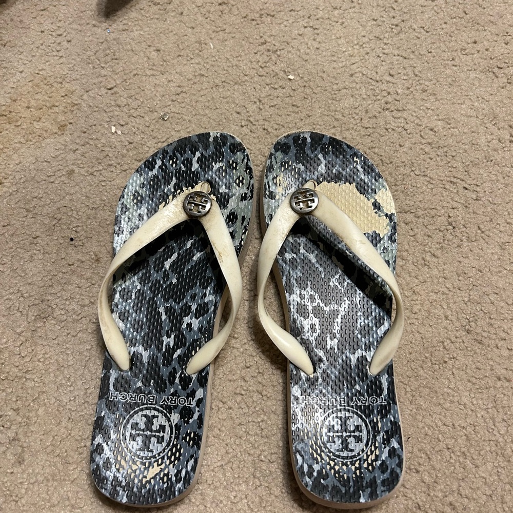 Tory Burch well worn women’s flip flops